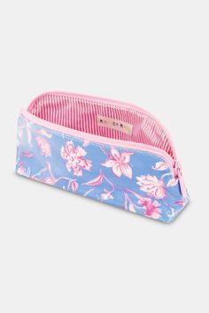 This makeup bag is almost as pretty as the looks you'll create! Use the small one to stash lipstick, eyeshadow, and cream blush and store brushes and face products in the larger one. They're ideal for travel or keeping your glam essentials all in one place at home. Materials and Care 100% Cotton Canvas with Protective Poly Coating Water-Resistant Wipe Clean Imported Measurement Information Small: 8" W, 4.75" H, 2.5" D Large: 10.5" W x 6.25" H, 3.25" D Floral Makeup Bag, Floral Makeup, Sleepover Bag, Lipstick Eyeshadow, Womens Dress Tops, Face Products, Roller Rabbit, Dream School, Baby Pajamas