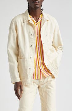 The British haberdasher draws inspiration from traditional workwear in this cotton-and-linen chore jacket detailed with an embroidered apple at the chest. 29 1/2" length (size 46) Front button closure Spread collar Front patch pockets 78% cotton, 22% linen Machine wash, line dry Made in Portugal Designer Clothing Spring Unstructured Utility Jacket With Buttoned Pockets, Spring Unstructured Utility Jacket With Button Closure, Spring Utility Jacket Single Breasted Unstructured, White Cotton Outerwear With Buttoned Pockets, White Cotton Outerwear With Lapel Collar, White Cotton Long Sleeve Utility Jacket, Vintage Beige Cotton Utility Jacket, Off White Cotton Outerwear For Fall, White Cotton Utility Jacket With Patch Pockets