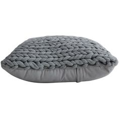 a gray dog bed that is made out of knitted fabric and has a pillow on top