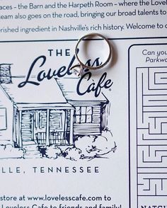 the loveless cafe keychain has been designed to look like a house