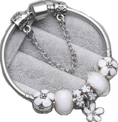 DAISY CHARM SILVER BRACELET - B ANN'S BOUTIQUE Silver Dainty Charms, Dainty Silver Charms, Elegant White Dangle Charms, Silver Beaded Bracelets With Flower Charm, Everyday White Dangling Charms, Elegant White Charms, Elegant White Silver Chain Bracelet, Everyday White Gold Charm Bracelet, White Sterling Silver Dangle Charms