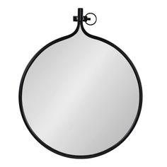 a round mirror with a black frame and an iron hook on the end of it