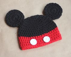 a knitted mickey mouse hat with ears