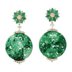 These stunning hand carved Jade earrings are crafted in 18-karat gold. It is set in 21.48 carats Jade, 1.94 carats emerald and 1.15 carats of sparkling diamonds. FOLLOW MEGHNA JEWELS storefront to view the latest collection & exclusive pieces. Meghna Jewels is proudly rated as a Top Seller on 1stDibs with 5 star customer reviews. All items manufactured by us are handmade and can be customized or redesigned. Composition Size-48X25 MM Total Weight-12.325 Gold Weight(Gms)-7.412 Diamond Wt(Cts)-1.15 Carved Jade, Jade Earrings, Gold Diamond Earrings, Jade Carving, Jade Jewelry, Women Diamond, Emerald Jewelry, Dream Jewelry, High Jewelry