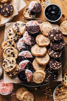 an assortment of cookies and pastries on a table