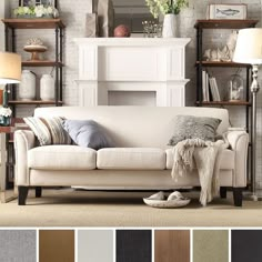 a living room filled with furniture and lots of different color samples on the wall behind it