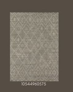 an area rug with diamond design on the bottom and sides, in grey tones is shown