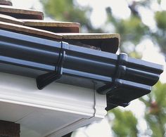 gutter guards on the roof of a house