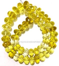 yellow glass beads are arranged in a circle