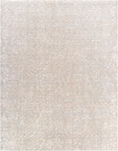 an area rug with white and beige colors