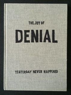 the joy of denial is written in black ink on a white linen book cover