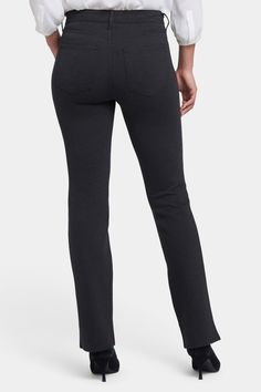 Our most popular silhouette, now in super-sculpting compression ponte. NYDJ's Marilyn Straight Pants have a flattering and versatile straight-leg fit that elongates the figure, and this pair is designed to be especially sleek with unique high-tech fabric that shapes and supports. Lift Tuck® Technology uses a proprietary slimming panel with a patented criss-cross design to flatten in front and lift in back for even more smoothness. The styling of this pair is finished with five pockets and a zip fly with button closure. These pants are part of Sculpt-Her™, NYDJ's most novel collection of compression-contouring silhouettes with an unparalleled, cutting-edge fit. | NYDJ Women's Marilyn Straight Pants in Charcoal Heathered, Regular, Size: 2 Stretch Bottoms With Straight Silhouette For Fall, Straight Silhouette Stretch Elastane Pants, Black Stretch Straight Pants, Stretch Elastane Pants With Straight Silhouette, Petite Pants, Cross Design, Petite Jeans, Petite Outfits, Bottom Clothes