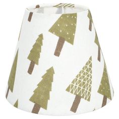 a small lamp shade with trees on white and green fabric, hanging from the ceiling