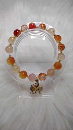 Sunset Serenade Crystal Glass Beads Bracelet with Gold Charms, Gold Chain, Crystal Heart Shape Glass Beads Charms. Each Charm is Random For Each Bracelet. Bohemian Crystal Bracelet With Heart Beads, Heart-shaped Beaded Crystal Bracelet For Jewelry Making, Bohemian Beaded Bracelets With Heart Beads, Bohemian Heart Bracelet With Colorful Round Beads, Heart-shaped Healing Beaded Bracelet, Adjustable Heart Bracelet With Round Beads, Healing Beaded Charm Bracelet, Orange Heart Beads Beaded Bracelet As Gift, Spiritual Crystal Bracelet With Heart And Round Beads