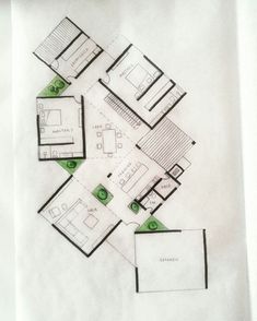 a drawing of a floor plan for a house in the middle of a room with green accents