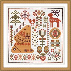 a cross stitch pattern with flowers and deers on the side, in orange tones