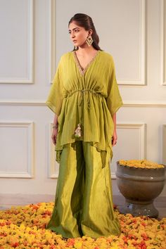 Lime kaftan featuring sequin hand embroidered neckline with tassel tie up waist. Paired with a flared pant. - Aza Fashions Summer Festive Kurta With Back Tassel Tie-up, Summer Festive Palazzo Set With Tassels, Traditional Summer Sets With Back Tassel Tie-up, Summer Palazzo Set With Tassels, Green Kaftan, Pant For Women, Embroidered Neckline, Pants Pattern, Aza Fashion