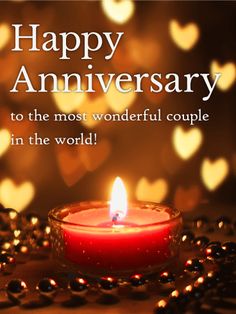 a red candle is lit in front of a heart - shaped background with the words happy anniversary to the most wonderful couple in the world