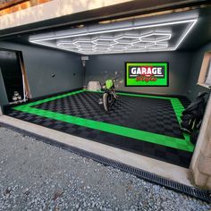 a garage with green and black checkered flooring