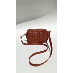 Our Siena leather crossbody bag features a beautiful basketweave texture perfect for summer outfits dressed up or down. Designed to keep your essentials secure and easily accessible while allowing you to go hands-free throughout your day. The leather outer maintains its structure and shape, while the inside is lined with stain resistant black nylon to hold up to the test of time. Ships in 5-7 Business days Qualifies for free shipping SPECS Made with Basketweave imprint Cowhide Dimensions: 8”W x Construction Crafts, Summer Dress Outfits, Black Nylon, Black Nylons, Siena, Hands Free, Basket Weaving, Leather Crossbody Bag, Leather Crossbody