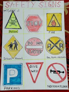 children's hand drawn safety signs on white paper