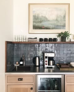 the kitchen counter is clean and ready to be used as a coffee bar or oven