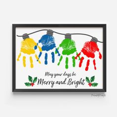 a christmas card with handprints hanging from a clothes line and the words merry and bright