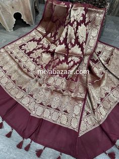 Gorgeous cotton silk wine Banarsi dupatta with beautiful rose motifs in gold zari. Unstitched Gold Jamawar Dupatta, Handloom Pashmina Dupatta For Wedding, Gold Pashmina Shawl With Zari Work For Eid, Wedding Pashmina Dupatta Handloom, Wedding Handloom Pashmina Dupatta, Gold Art Silk Shawl For Eid, Traditional Gold Pashmina Dupatta, Gold Pashmina Shawl For Eid, Gold Pashmina Shawl For Eid Festival