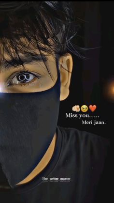 a person with a black mask on their face and the caption miss you, meri jan