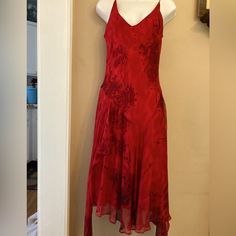 This Is A Beautiful 100% Silk Chiffon, Polyester Lining Dress With Spaghetti Straps And V Neck And Back. It Is Fitted To Waist Then Flowing Skirt With Longer Handkerchief Pieces On The Sides. The Silk Chiffon Top Fabric Has Abstract Design. 21” Across Back From Pit To Pit. 25” From Back Waist To Center Hem. Worn Once For A Special Event. Fitted Cocktail Dress With Handkerchief Hem, Red Silk Dress With Spaghetti Straps, Red Bias Cut Dress With Spaghetti Straps, Summer Formal Dress With Handkerchief Hem, Formal Summer Dress With Handkerchief Hem, Red V-neck Bias Cut Dress, Red Fitted Silk Midi Dress, Fitted Red Silk Midi Dress, Handkerchief Hem