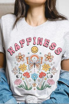 Spread happiness with our HAPPINESS RETRO GARDEN Graphic T-shirt. Made from high-quality materials, this shirt features a vintage-inspired graphic that will surely bring a smile to your face. Comfortable and stylish, it's the perfect addition to your wardrobe. Surround yourself with positivity and joy! SPECIFICATIONS: Premium 4.2 oz., 100% airlume combed and ringspun cotton. Retail fit Unisex sizing Shoulder taping Sideseamed Pre-shrunk Style: CASUAL Print / Pattern: LOVE MORE WORRY LESS Silhouette: TEE Fit: UNISEX Neckline: CREW Sleeve: SHORT Fabric Contents: 100% COTTON Stretch fabric. Non-sheer fabric Care Instructions: Machine wash warm, inside out, with like colors. Tumble dry low. Medium iron. Do not iron decoration. Do not dry clean. Size Measurement (inch): S: 18.0 (Bust), null (Wa Retro Slogan T-shirt For Spring, Vintage Text Print T-shirt For Spring, Hippie Letter Print Tops For Spring, Fun Slogan T-shirt For Spring, Hippie Cotton T-shirt With Graphic Print, Fun T-shirt With Funny Print For Spring, Vintage Slogan Tops For Spring, Hippie Graphic Print Short Sleeve T-shirt, Hippie Style Short Sleeve T-shirt With Graphic Print