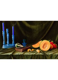 a painting of fruit and candles on a table