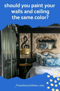 a bedroom with blue and gold decor on the walls