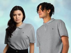 This premium embroidered  unisex Wind Turbine  polo shirt is the perfect addition to any eco-conscious wardrobe! The intricate embroidery of a wind turbine on the chest adds a unique and stylish touch, while also promoting renewable energy. Made from a durable cotton pique fabric. The relaxed and flattering fit is designed to complement any body type.  Show off your love for sustainability in style and make a statement with this premium wind turbine embroidery polo shirt! This Unisex Pique Polo Shirt is also very versatile and guaranteed to make you look your best for any occasion.  With a classic cut and crisp collar, it can be dressed up or down for sporty, casual, or more formal styles.  A truly classic piece that never goes out of style! * 100% ring-spun cotton * Fabric weight: 5.2 oz/ Embroidered Cotton Polo Shirt, Pique Fabric, Embroidered Polo Shirts, Style Sportif, Wind Energy, Polo Golf, Intricate Embroidery, Pique Polo Shirt, Formal Style