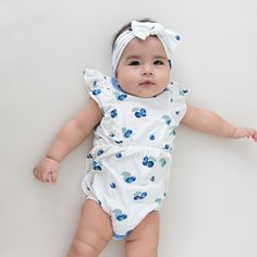 Our hearts are aflutter for this classic bubble romper that’s as cute as can be. Flutter sleeve details add the sweetest touch, while the bubble silhouette creates an adorable all-in-one outfit. Crafted from soft, stretchy bamboo, this lightweight romper keeps little ones cool and comfortable throughout the warmer months. 97% Bamboo Rayon, 3% Spandex Flutter sleeves Inseam snap closures Single snap closure at the back Bubble silhouette Flutter Sleeve Bubble Romper With Ruffles For Playtime, Spring Cute Bubble Romper With Ruffle Sleeves, Playful Ruffle Bubble Romper For Playdate, Cute Ruffled Bubble Romper For Playtime, Playful Blue Bubble Romper For Summer, Spring Playtime Bubble Romper With Flutter Sleeve, Cute Cotton Bubble Romper With Flutter Sleeves, Short Sleeve Ruffle Bubble Romper For Playdate, Short Sleeve Bubble Romper With Ruffles For Playdate