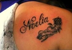 a woman with a tattoo on her shoulder that says,'sheila'and an apple