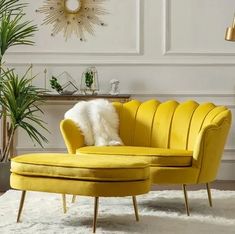 a yellow chair and ottoman in a living room with white rugs on the floor