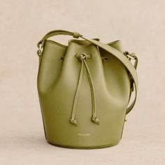 Iso This Adorable Bag! Green Bucket Bag With Detachable Strap And Double Handle, Elegant Green Bucket Bag With Adjustable Strap, Green Satchel Bucket Bag With Detachable Strap, Green Bucket Bag Satchel With Detachable Strap, Green Top Handle Bucket Bag For Travel, Green Bucket Bag With Detachable Strap For Shopping, Elegant Green Crossbody Bucket Bag, Chic Green Pouch Bag, Chic Green Bucket Bag