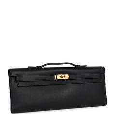 This Hermes Kelly Cut is in Black swift leather with gold hardware, features tonal stitching, front flap, pull straps that attach to a toggle, and small top handle.The interior is lined in Black swift leather and has one interior slit pocket on front wall.Collection: XOrigin: FranceCondition: Never worn (plastic on the hardware)- a few small press marks on front bottom and back of bagAccompanied by: Hermes box, Hermes dustbag and carebookMeasurements: 12.25" width x 5" height x 1" depth Hermes Clutch, Kelly Cut, Hermes Birkin 25, Front Wall, Hermes Birkin 30, Hermes Box, Fancy Bags, Birkin 25, Front Bottoms