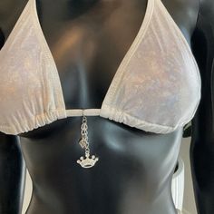 Make A Splash At The Beach Or Pool With Our Charming Bikinis Crown Charm. This Elegant Bikini Top Features A Regal Crown Charm For A Touch Of Royal Flair. Charming Bikini Charms Are The Newest-Hottest Item Out! They Are Removable Charms So You Can Use Them On Other Bikinis. Patent Pending Silver Festival Swimwear For Summer, Silver Triangle Top Swimwear For Beach, Silver Triangle Top Swimwear For Beach Season, Silver Triangle Top Swimwear For Summer, Silver Swimwear For Summer Beach, Silver Beach Swimwear For Summer, Silver Swimwear For Beach In Summer, Party Swimwear With Adjustable, Bra-friendly Fit, Fitted Silver Swimwear For The Beach