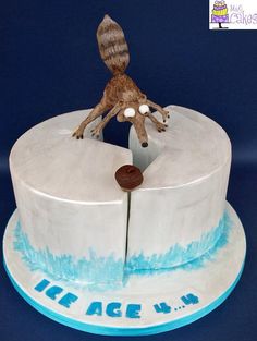 a cake that has a dog on top of it