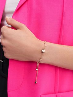 Add a bit of sparkle to your everyday outfit with this fine bracelet. Featuring a crystal-embellished star centrepiece and sparkle charms along the delicate wrist chain, this pretty piece is especially stunning when it catches the light. The subtle shine of this dainty jewellery will complete a sophisticated evening look perfectly. Star Centerpieces, Wrist Chain, Dainty Jewellery, Star Motif, Tattoo Bracelet, Charles Keith, Everyday Outfit, Gold Star, Indian Jewellery