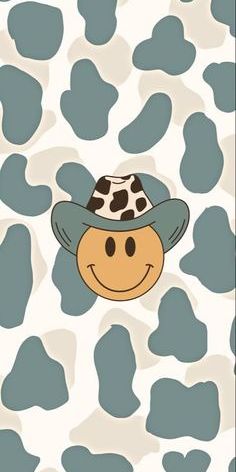 a cow print with a cowboy hat on it