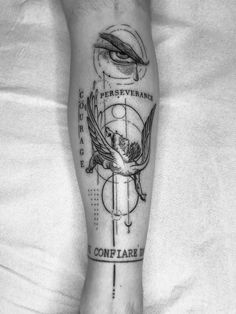 a person with a tattoo on their leg that reads, contemplate the eye