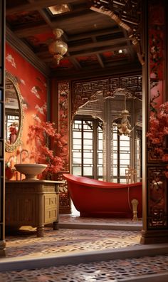 a red bath tub sitting inside of a bathroom