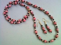 Pink and Black Bicone Paper Beads, Pink and Black Glass Beads, accented with Gold Seed Beads.  Necklace measures 28.5" and Earrings measure 1.5" Seed Beads Necklace, Candy Bracelet, Black Necklace, Paper Beads, Gold Art, Necklace And Earrings, Beads Necklace, Etsy Jewelry, Pink And Black