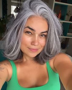 <p>This sleek silver bob sits just above the shoulders with a subtle inward curve. The natural grey color is uniform and vibrant, giving off a fresh and modern vibe. This low-maintenance style is ideal for women who prefer a clean-cut look that's both professional and stylish.</p>