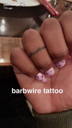 Minimalist Finger Tattoo Idea - Justine Skye - Barbed Wire Finger Tattoo Design Idea Barb Wire Tattoo For Women Arm, Small Barbwire Tattoo, Cowgirl Hand Tattoo, Cowboy Finger Tattoo, Hand Tattoos For Women Country, Trigger Finger Tattoo, Barb Wire Finger Tattoo, Barbwire Finger Tattoo, Cute Simple Western Tattoos