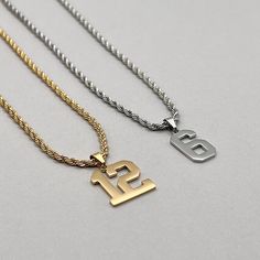 two necklaces with the number twenty and one is gold