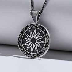 Sun Sterling Silver Engraved Coin Pendant Necklace is a dainty necklace. The coin pendant is engraved with your own message, making it the perfect personalized gift for any man in your life. This necklace is a perfect gift for men. It's meaningful, unique and well-made. The front side of the coin necklace is engraved with 'Sun' which represents light and masculine energy. The backside of the coin pendant is engraved with your special words so that it could be personalised just like a message in Spiritual Sterling Silver Engraved Medallion Necklace, Symbolic Engraved Medallion Necklace, Symbolic Medallion Necklace With Engraving Option, Spiritual Silver Necklace With Engraving Option, Spiritual Pendant Necklaces With Engraving Option, Spiritual Pendant Necklace With Engraving Option, Symbolic Necklace With Round Pendant And Engraving Option, Spiritual Round Pendant Necklaces With Engraving Option, Antique Silver Etched Necklace As Gift